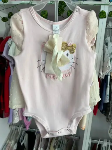 Conjunto mameluco y falda 